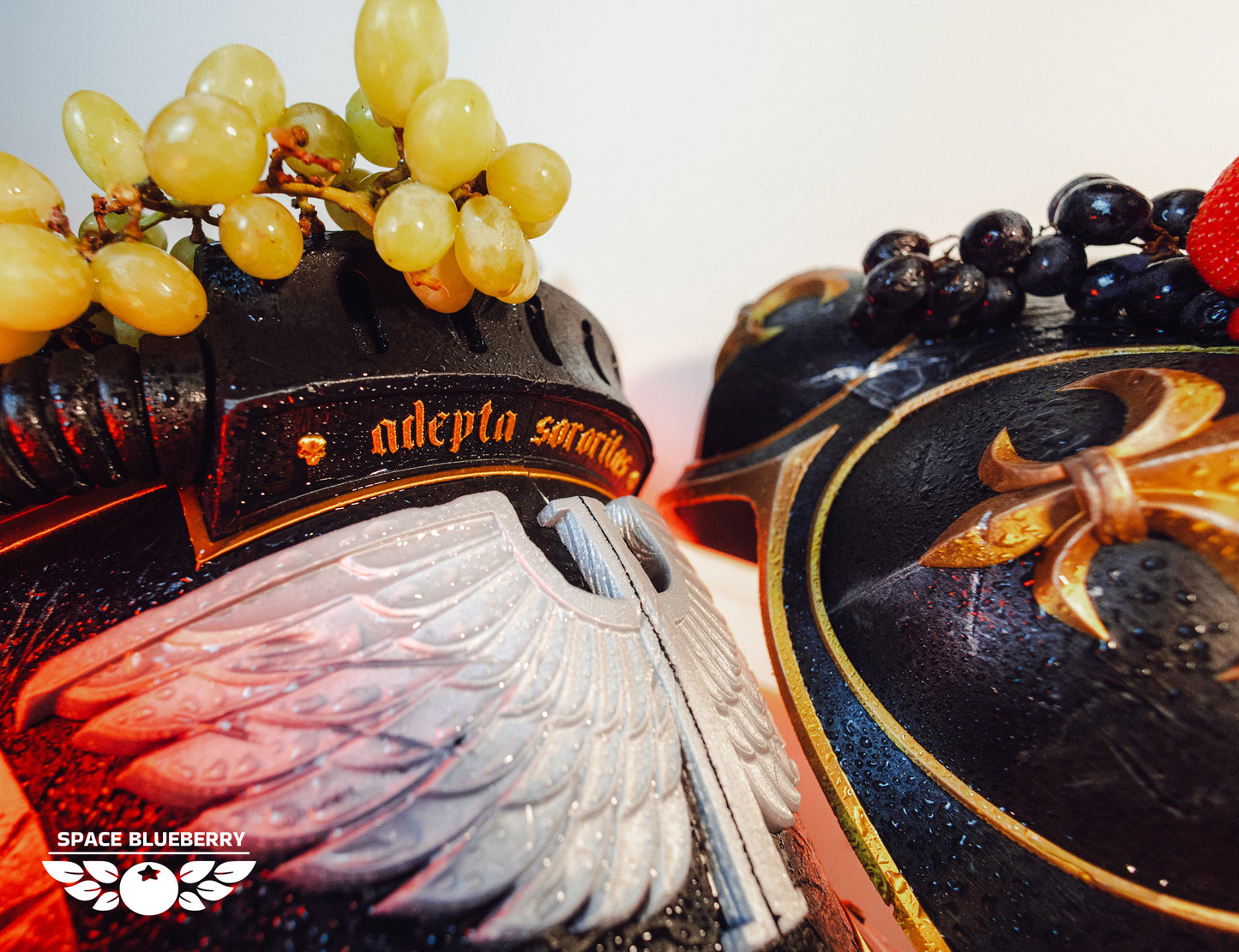 Decorative Sister of Battle armor with angel wings and adepta sororitas insignia and fruit on a white background, 3D printed cosplay STL file.